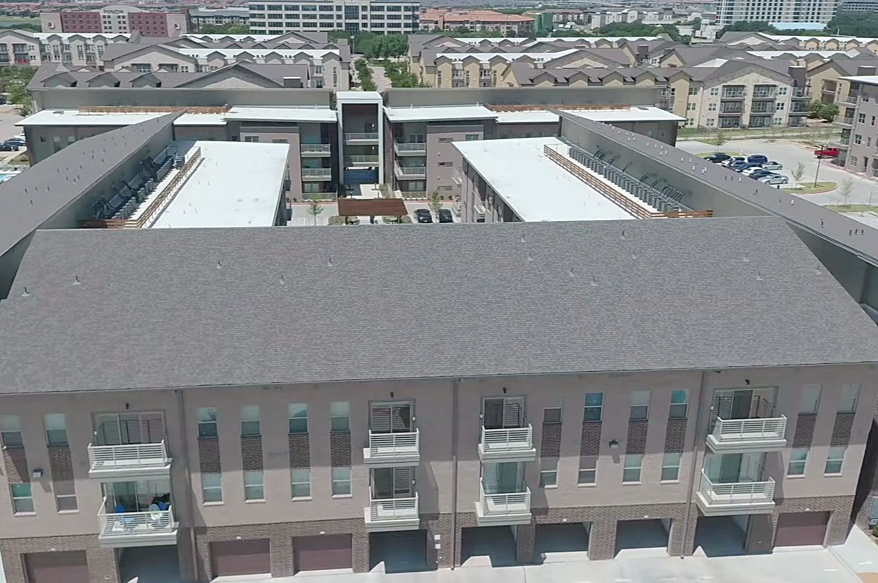Standing seam metal roofing above the balconies at Alta at Mercer Crossing